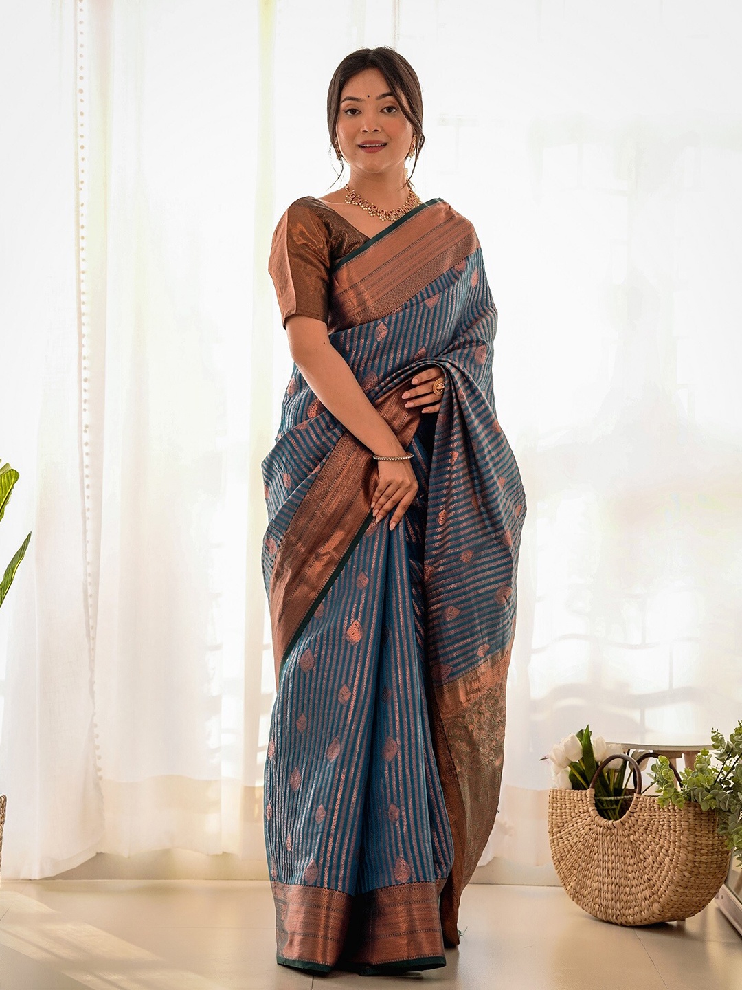 

Anouk Floral Woven Design Zari Kanjeevaram Saree, Teal