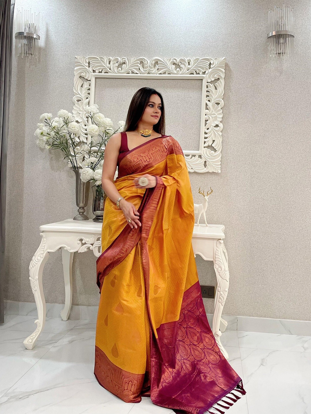 

Anouk Ethnic Motifs Woven Design Zari Kanjeevaram Saree, Mustard