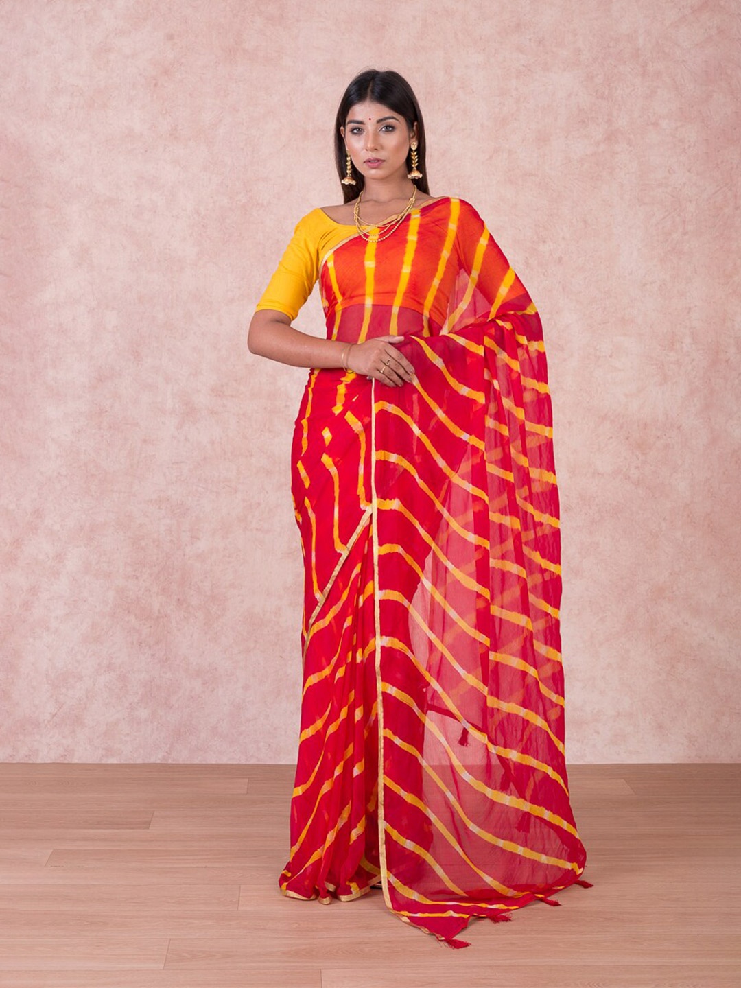 

Kishori Sarees Leheriya Printed Pure Chiffon Saree, Red