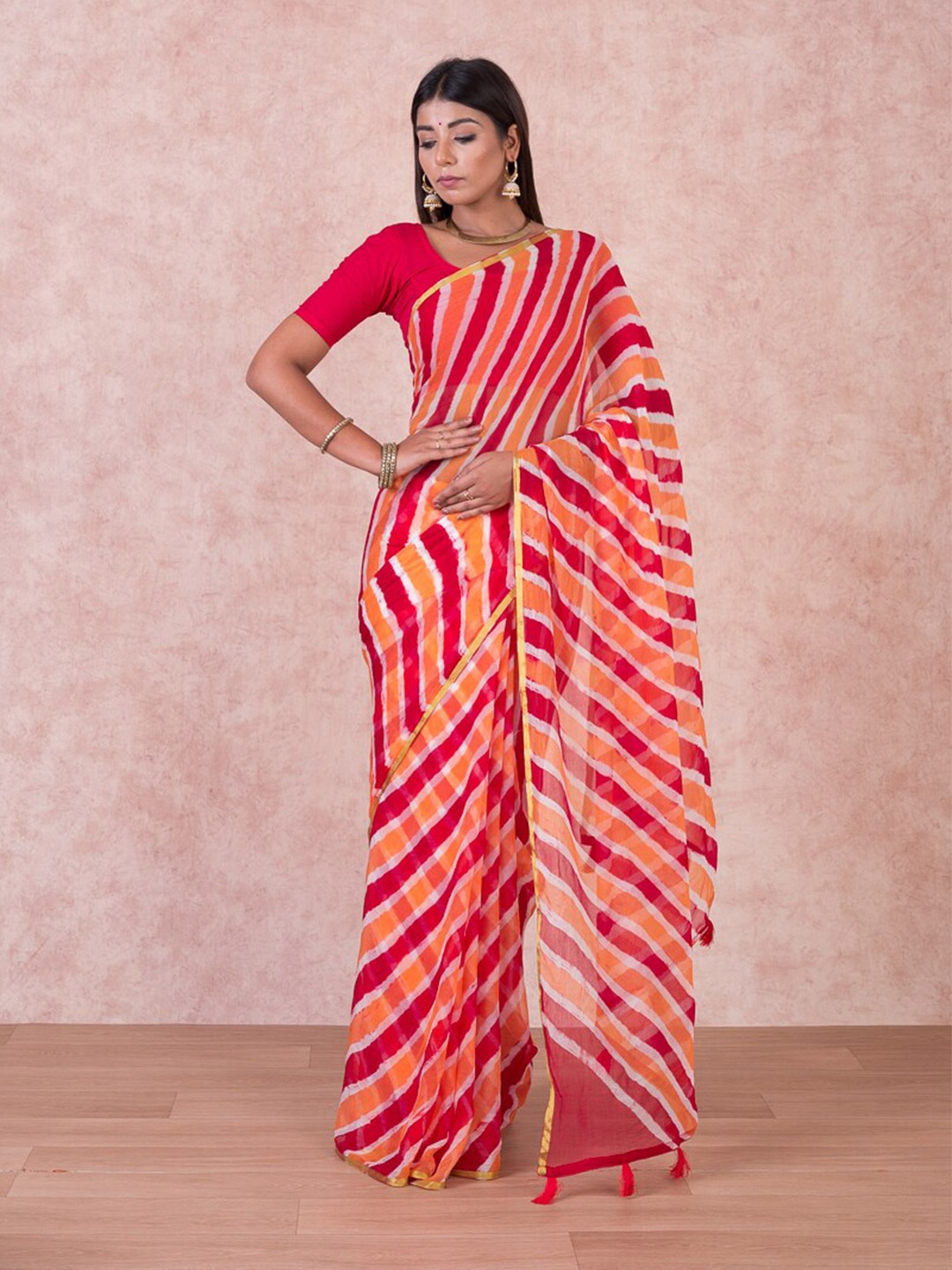 

Kishori Sarees Leheriya Printed Pure Chiffon Saree, Orange