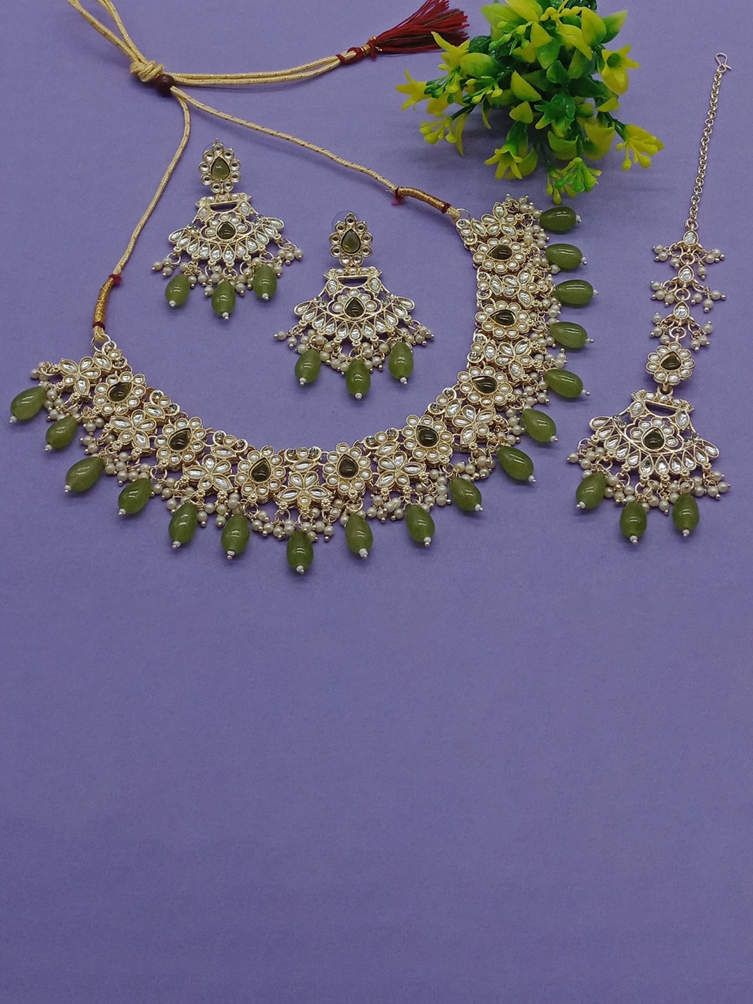 

AASHISH IMITATION Gold Plated Kundan Studded & Beaded Jewellery Set