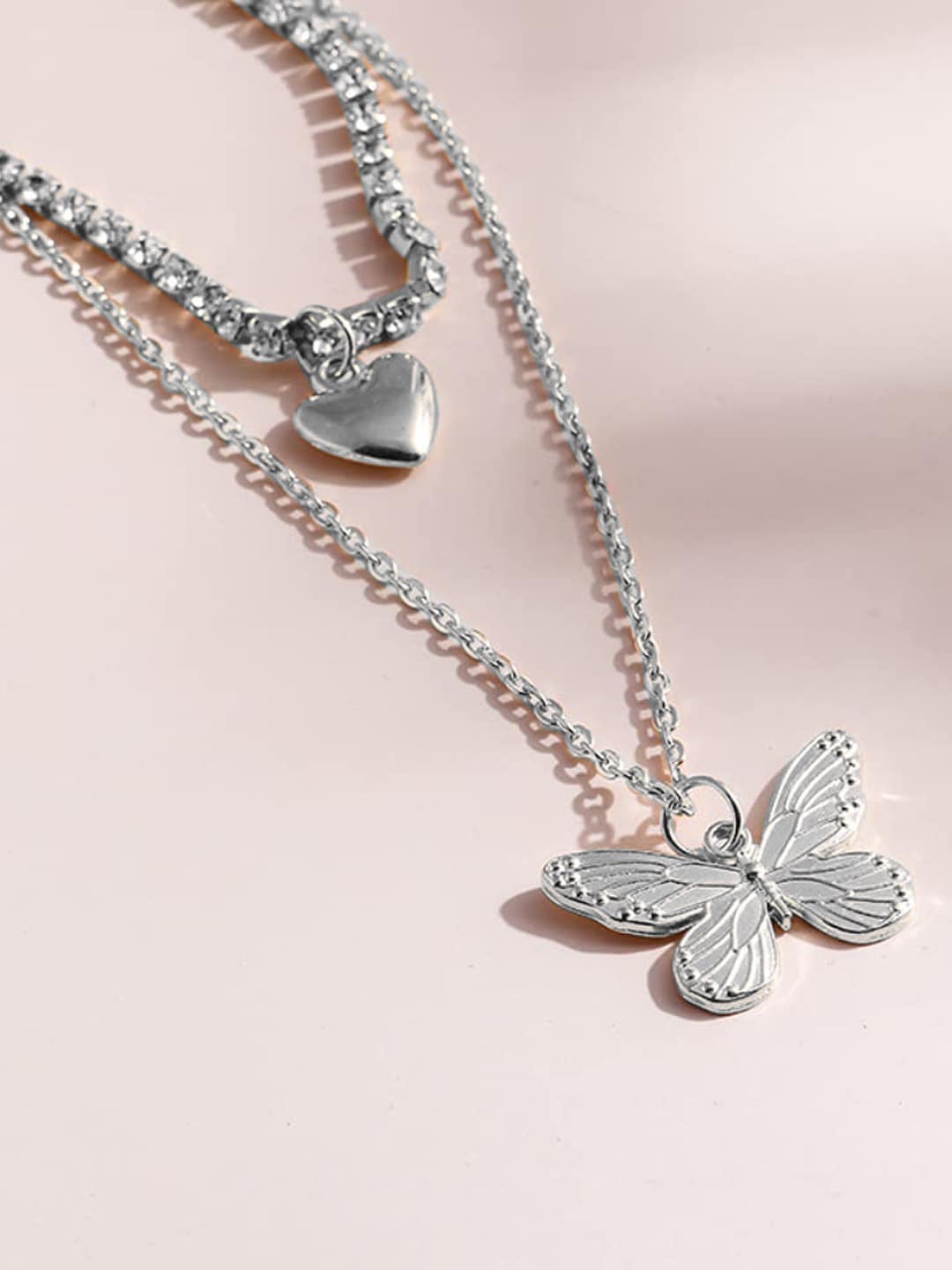 

Krelin Silver Plated Butterfly & Heart Shaped Layered Necklace