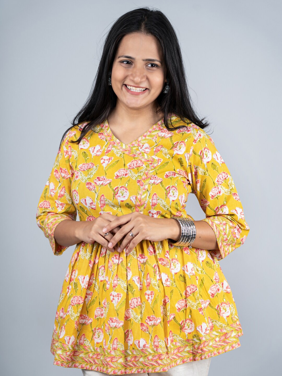 

Masang Floral Printed V-Neck Pure Cotton Pleated Kurti, Yellow