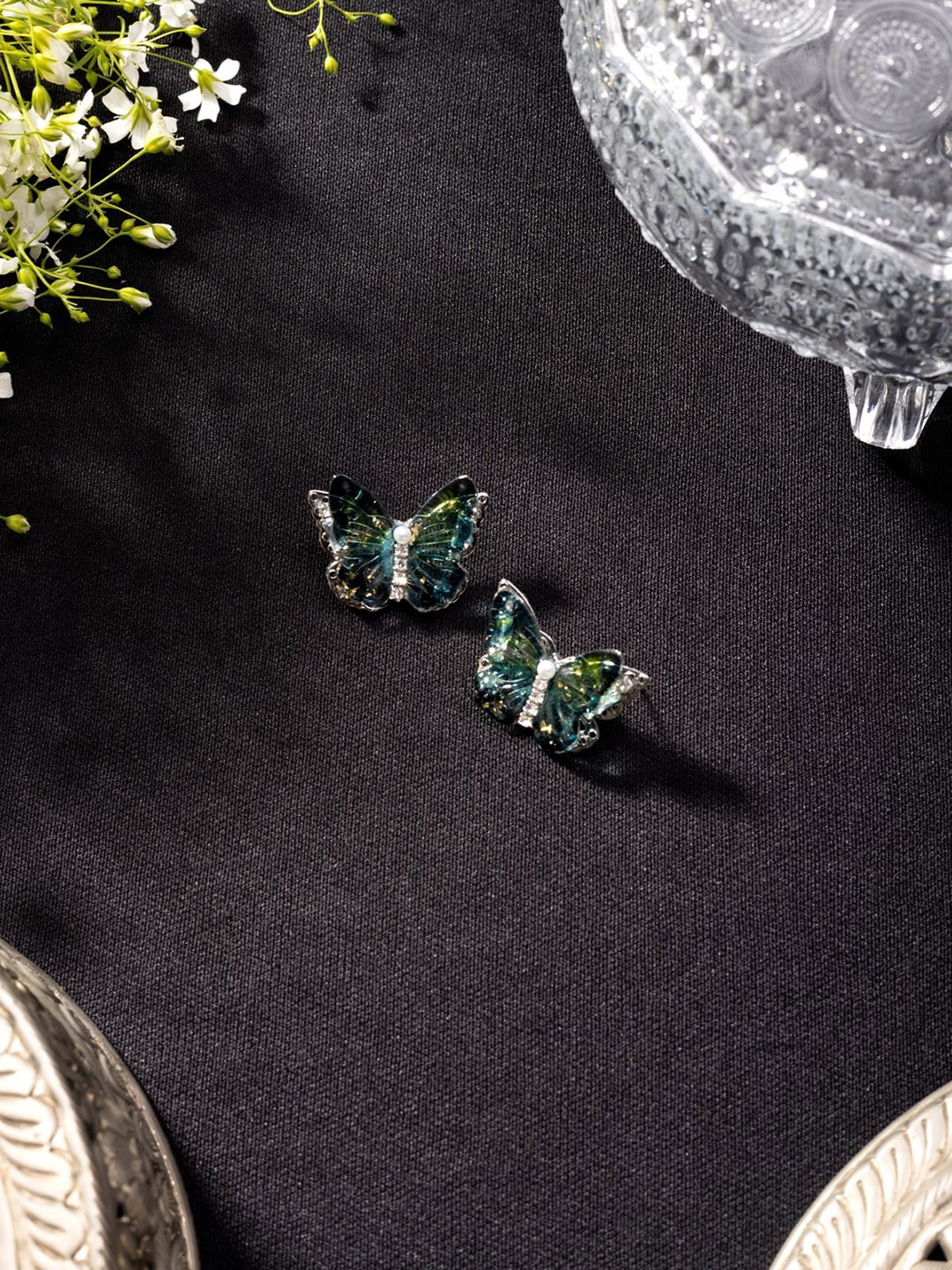 

Niscka Silver-Plated American Diamond Studded Studs Earrings, Blue
