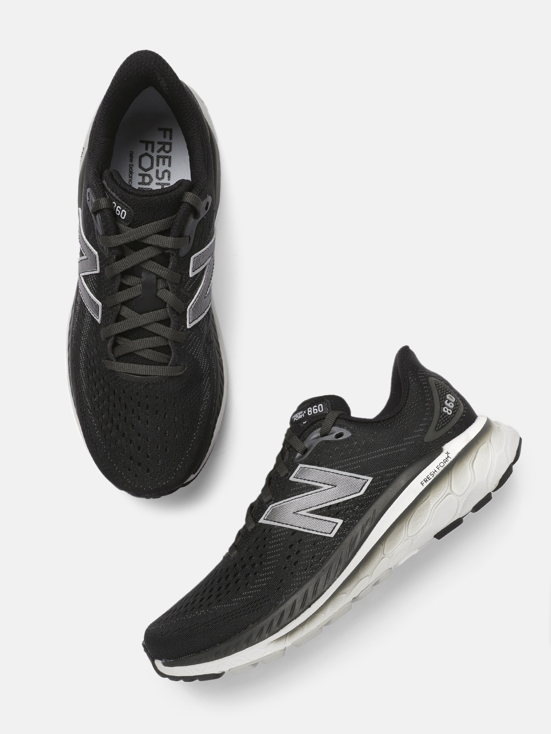

New Balance Men Woven Design 860 Running Shoes, Black