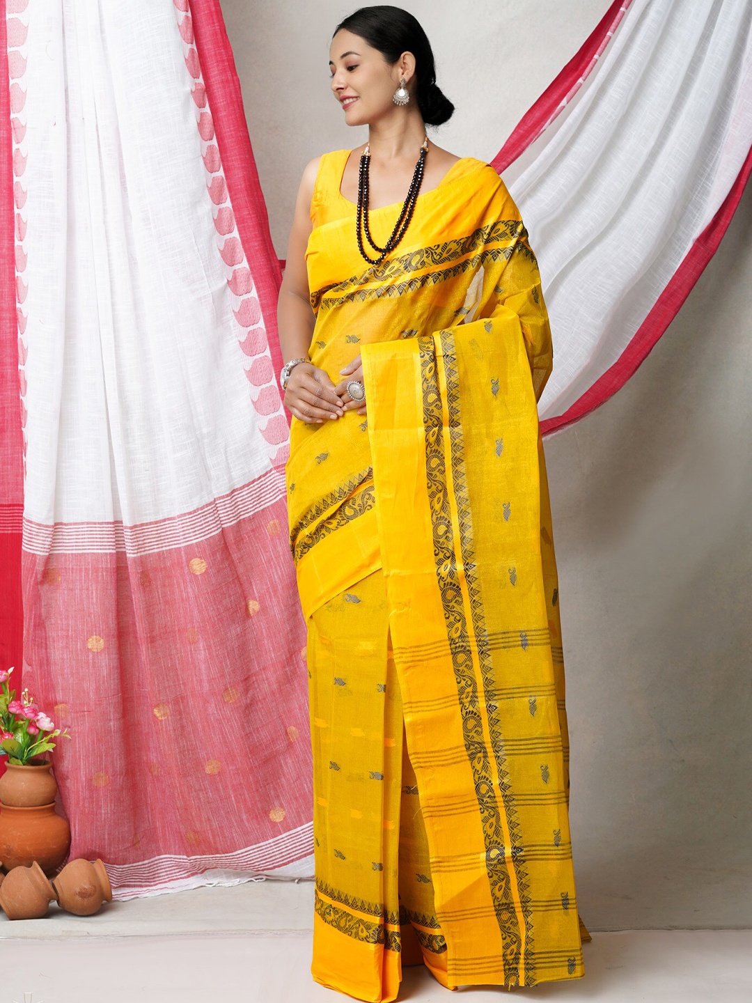 

Unnati Silks Woven Design Pure Cotton Jamdani Saree, Yellow