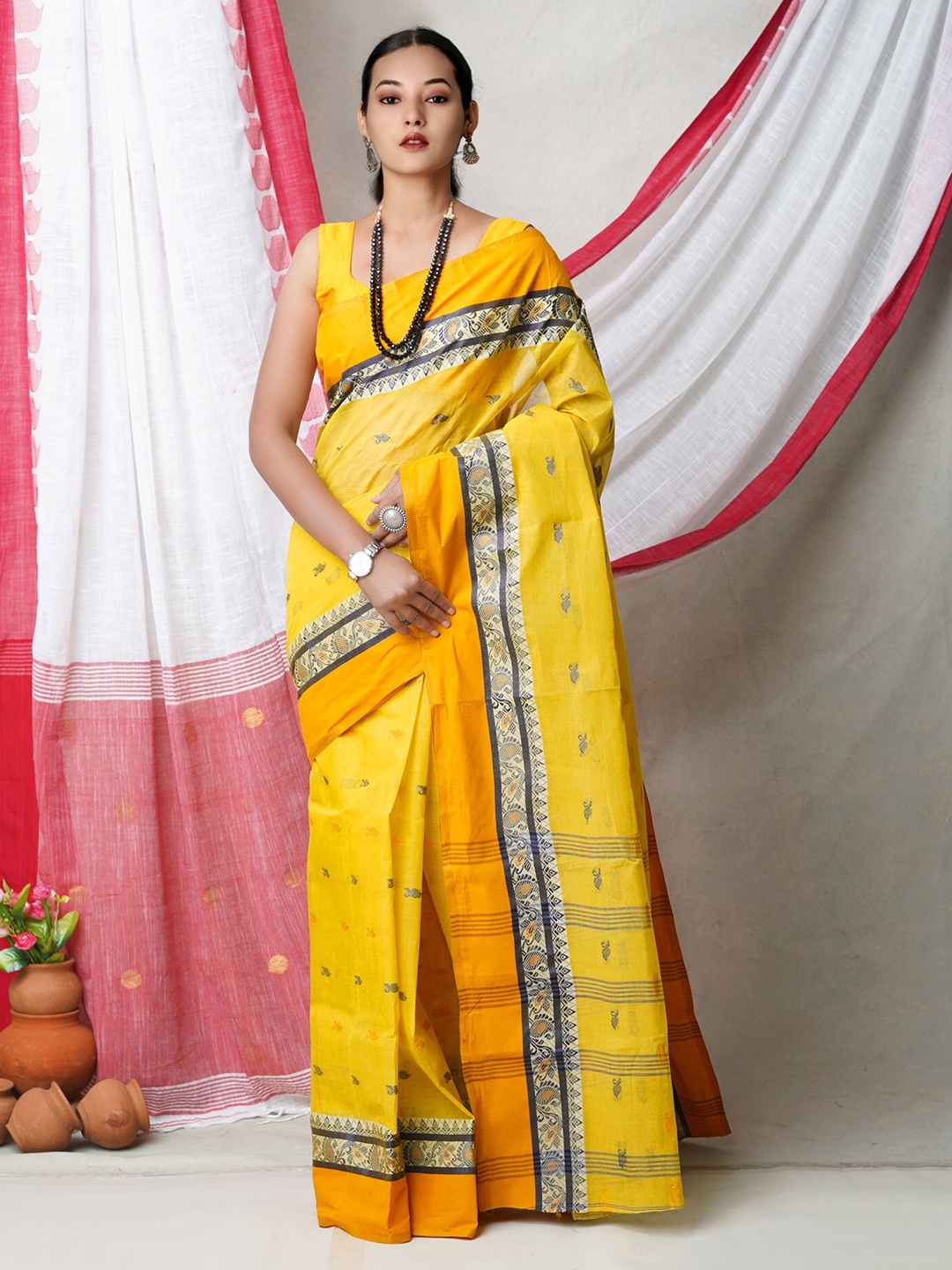 

Unnati Silks Woven Design Pure Cotton Jamdani Saree, Yellow