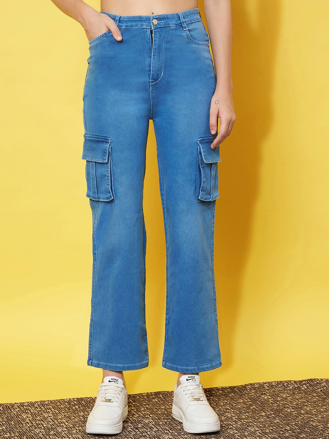 

Purple Feather Women Smart Flared High-Rise Clean Look Cargo Style Stretchable Jeans, Blue