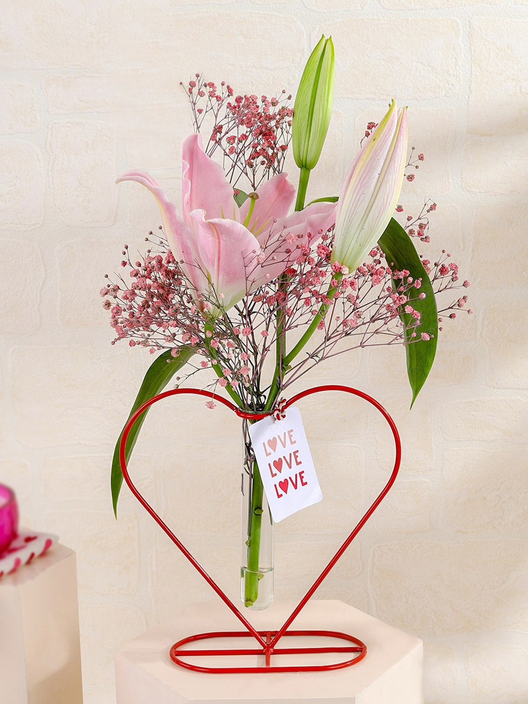 

IGP Lily With Gypso & Heart-Shaped Stand, Pink