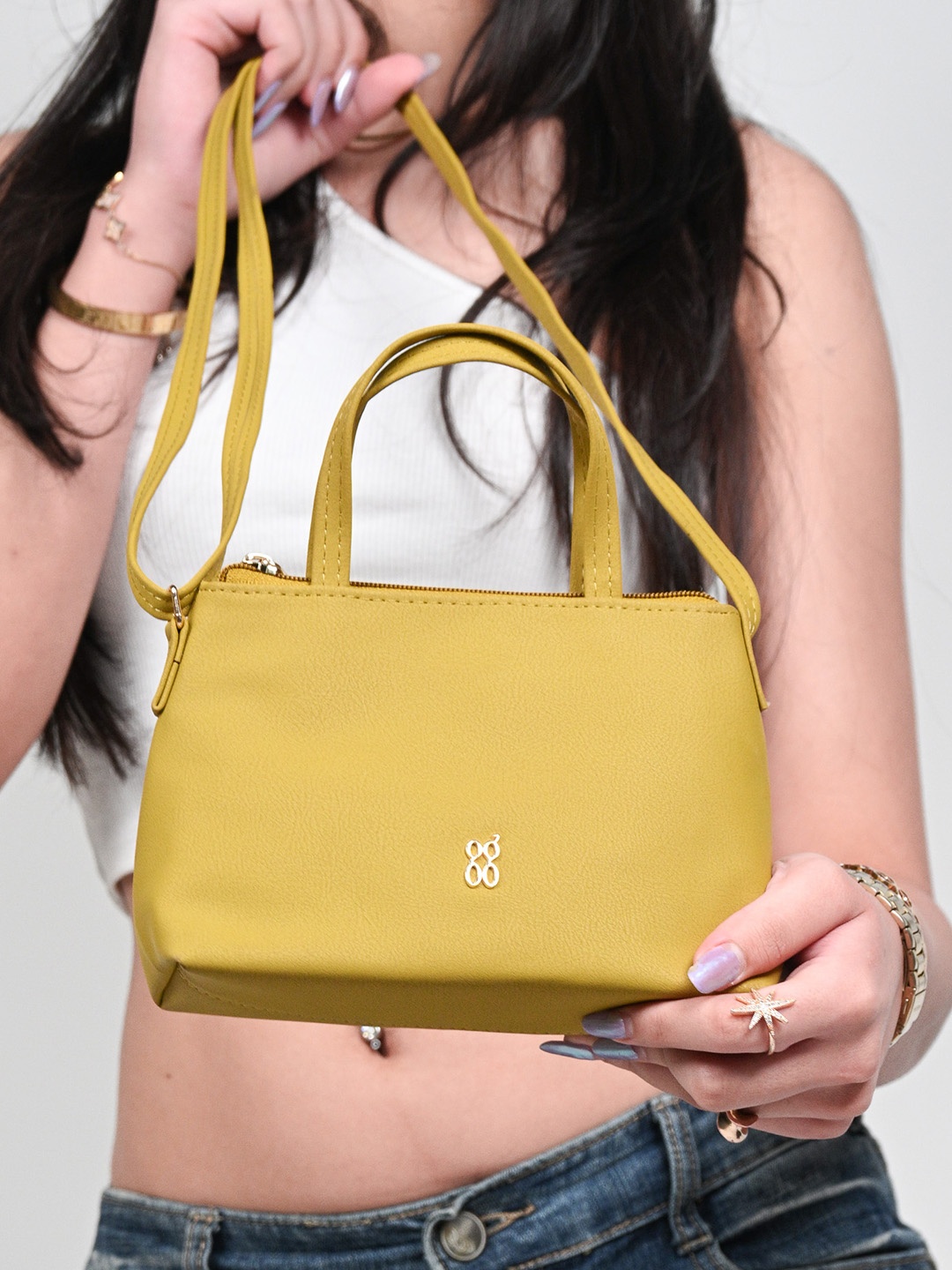 

Baggit Structured Handheld Bag, Yellow