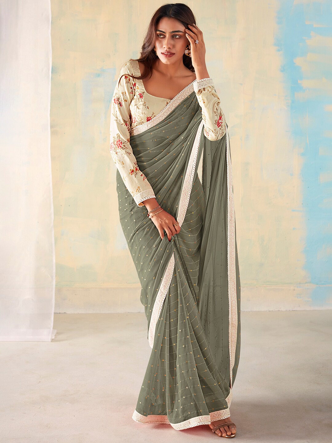 

Mitera Grey Embellished Sequinned Pure Georgette Saree