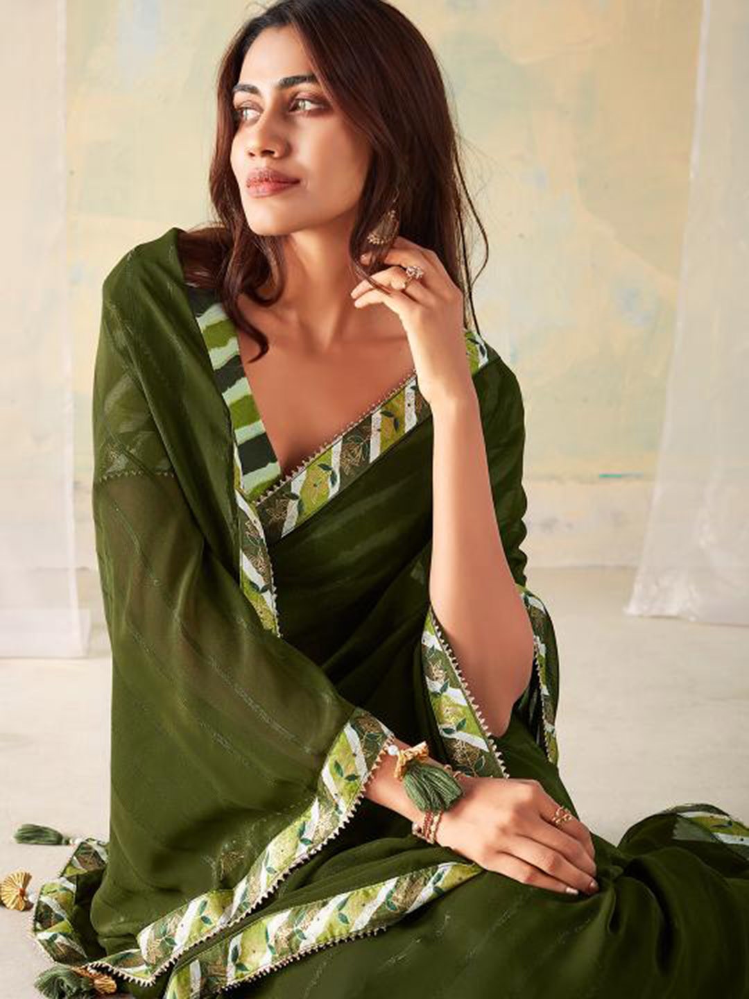 

Mitera Embellished Pure Georgette Saree, Green