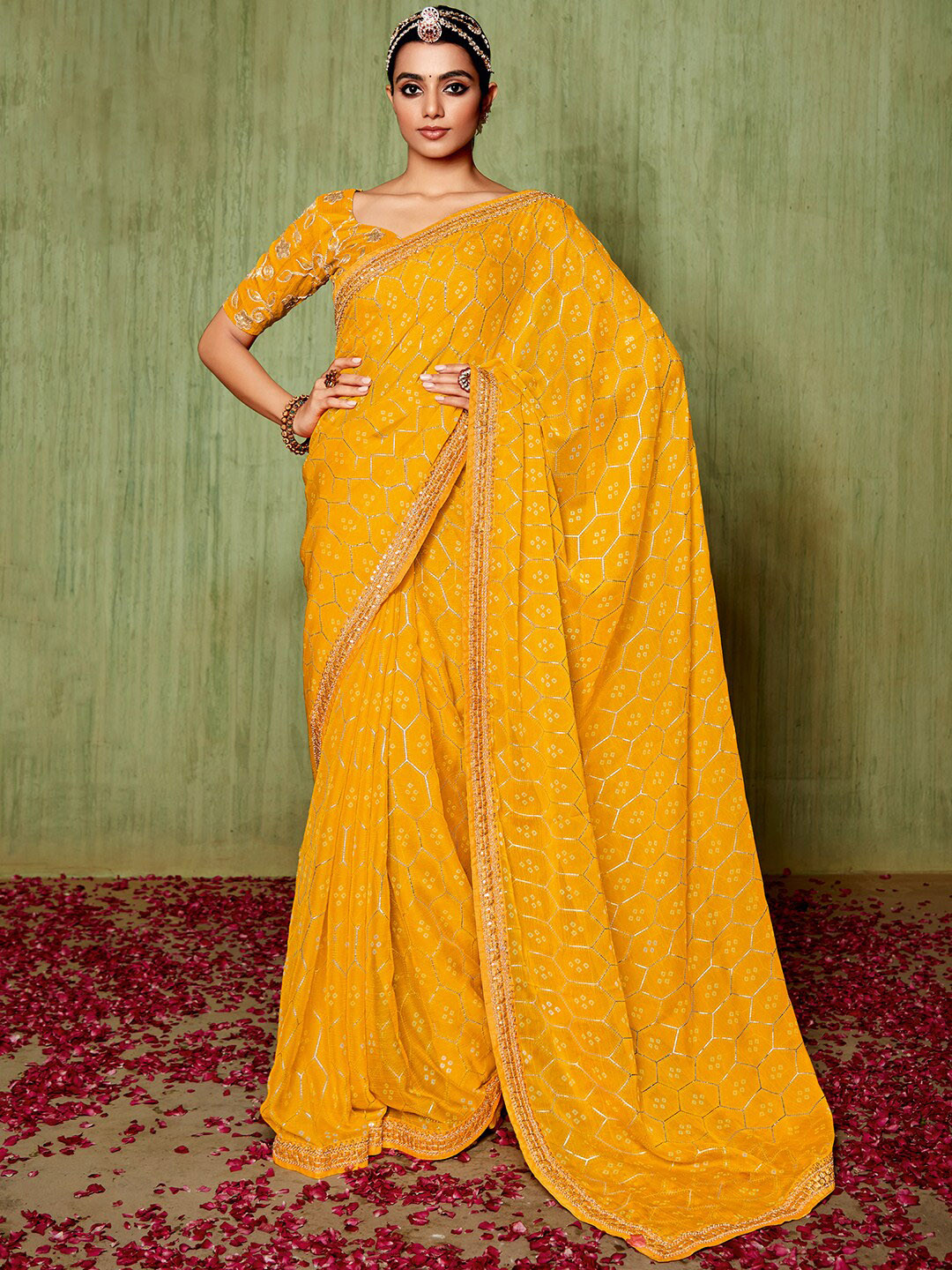 

Mitera Yellow Bandhani Printed Embroidered Pure Chiffon Saree