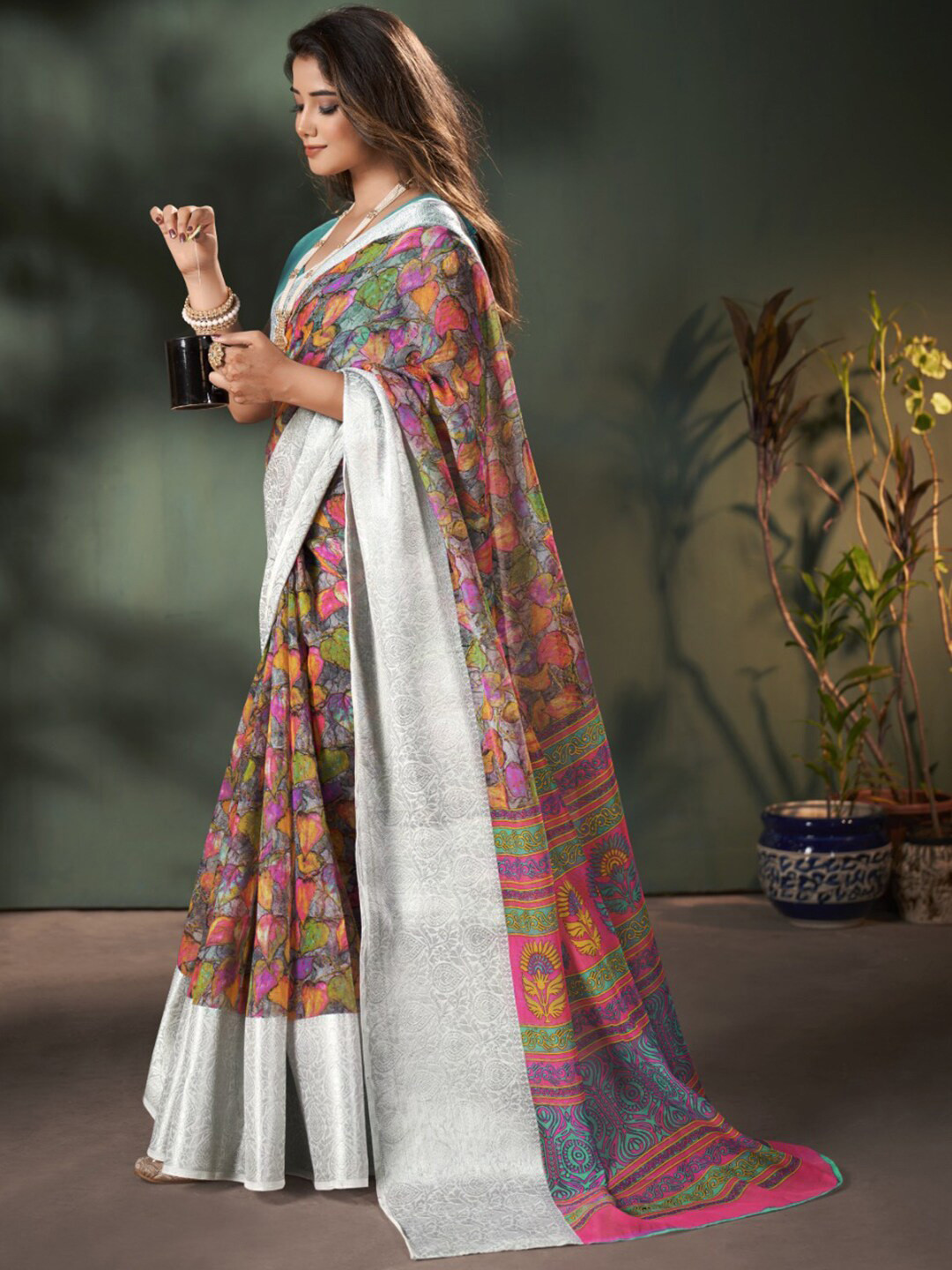 

Mitera Green Floral Printed Zari Silk Cotton Saree