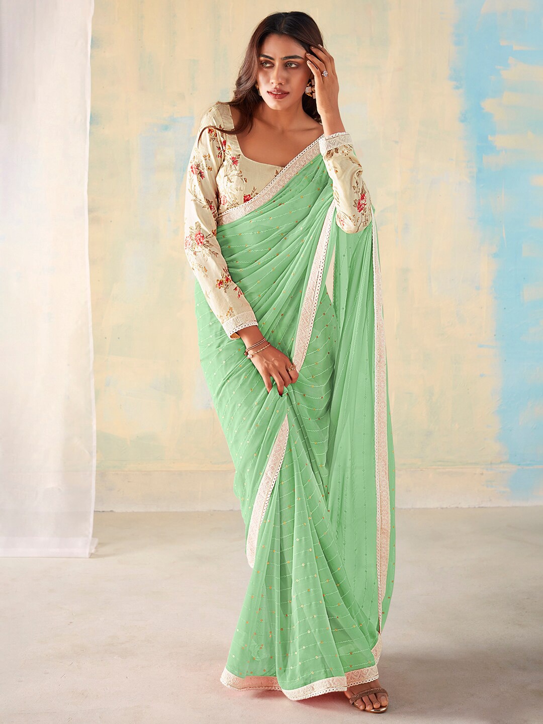 

Mitera Sea Green Embellished Sequinned Pure Georgette Saree