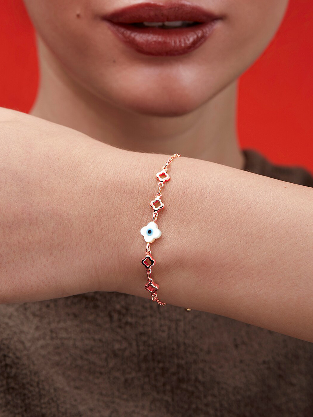 

MINUTIAE Women Brass Crystal Studded Rose Gold-Plated Link Bracelet