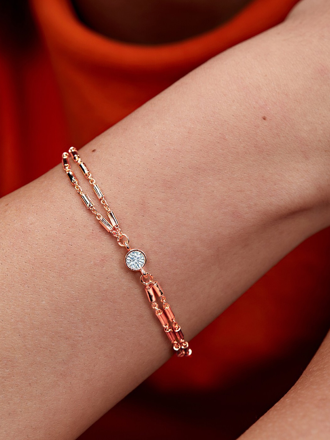 

MINUTIAE Women Brass Crystals Studded Rose Gold-Plated Link Bracelet