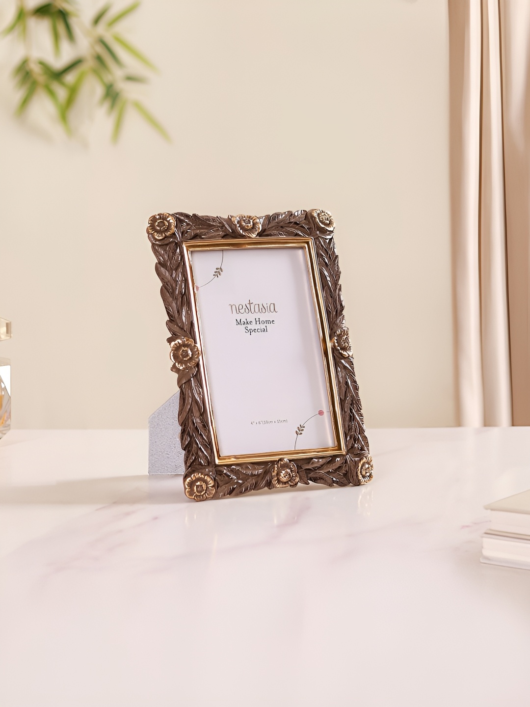 

Nestasia Brown Acrylic Table Photo Frames