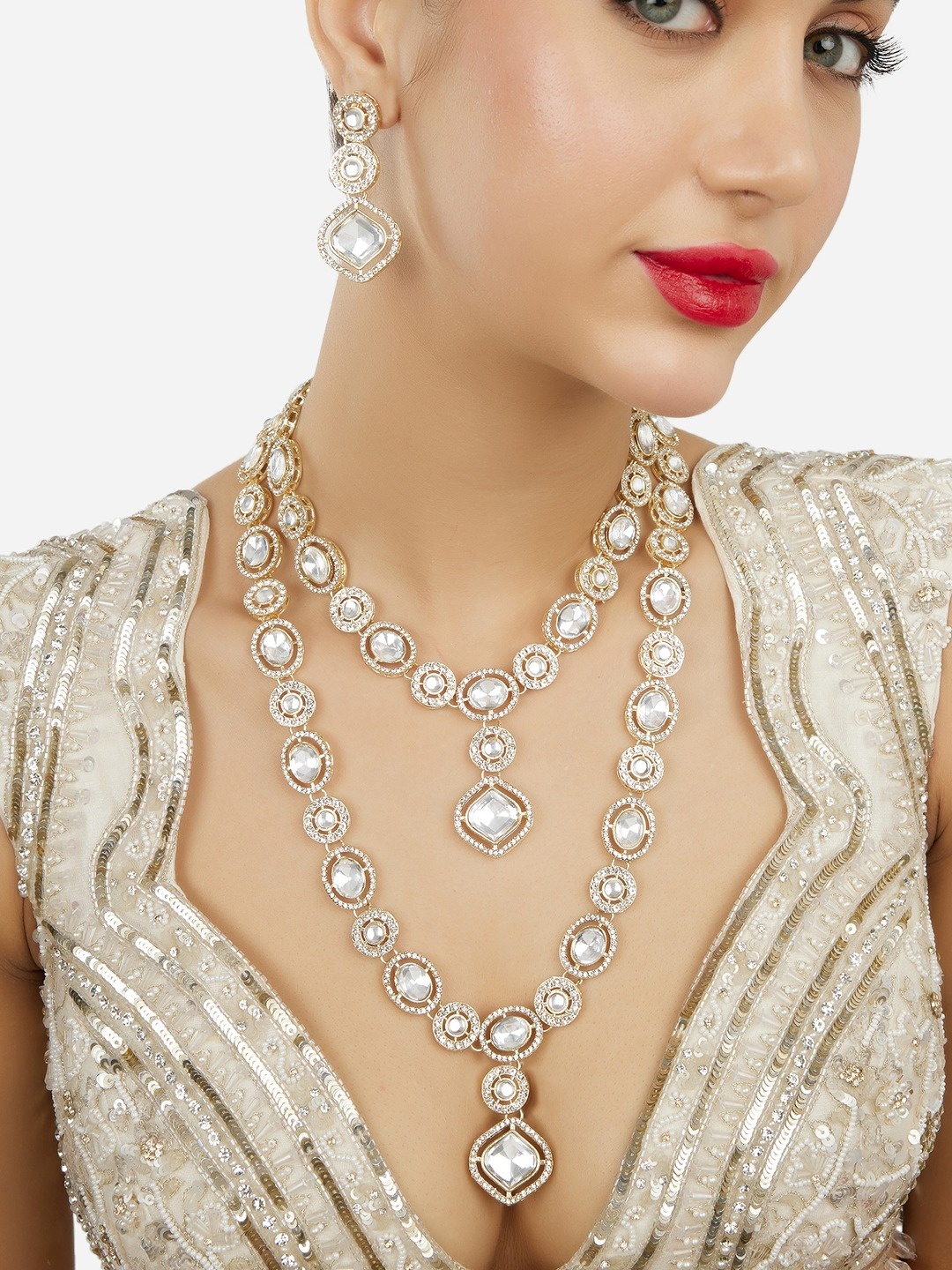 

Zaveri Pearls Women Gold-Plated Austrian Diamond Stone Studded Necklace And Earrings