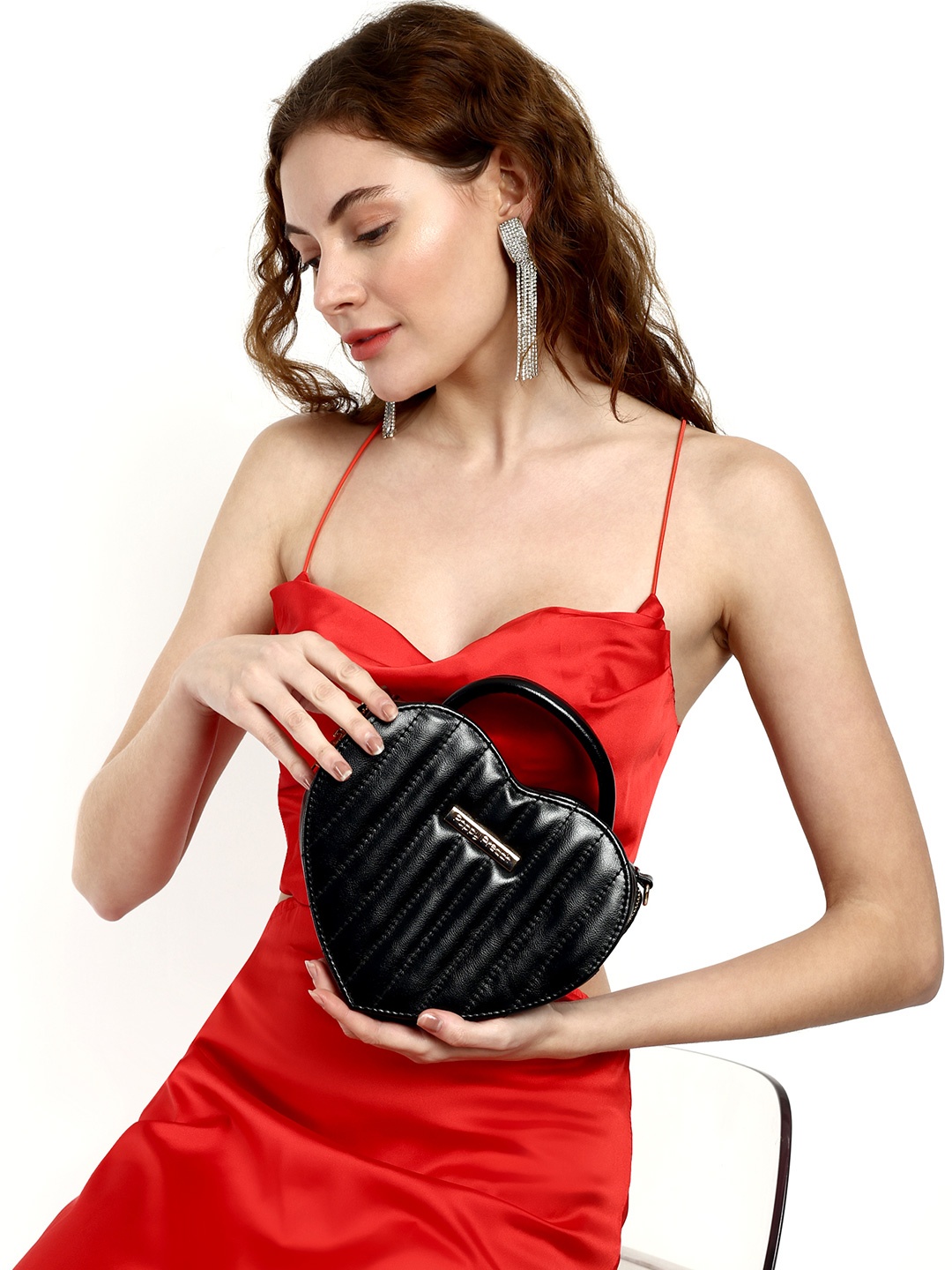 

Poppy Preach Heart Shape Structured Sling Bag, Black