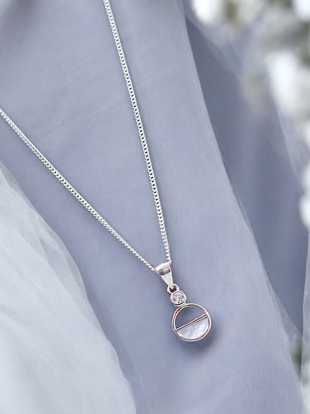 

Taraash 925 Sterling Silver Cubic Zirconia Studded Circular Pendant & Chain