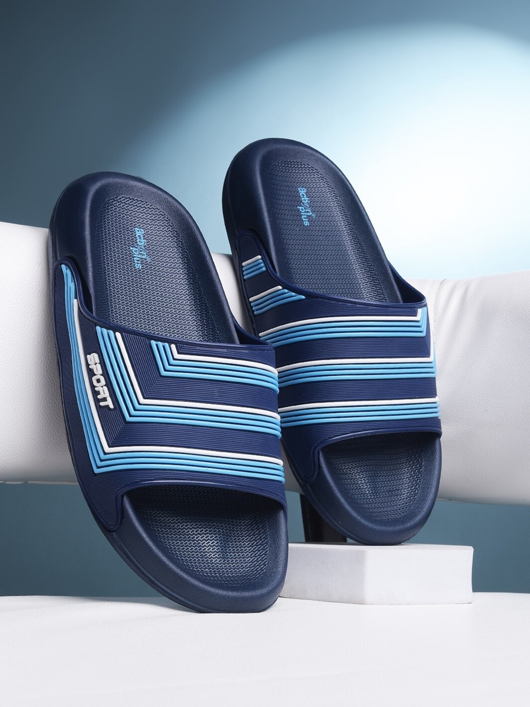 

Action Plus Men Striped Rubber Sliders, Navy blue