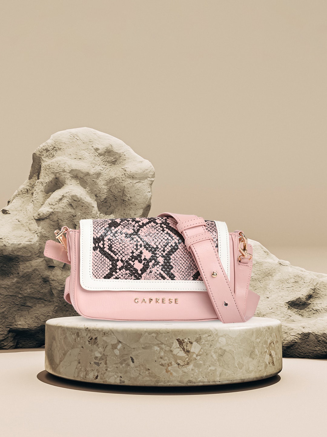 

Caprese Animal Textured Structured Sling Bag, Pink