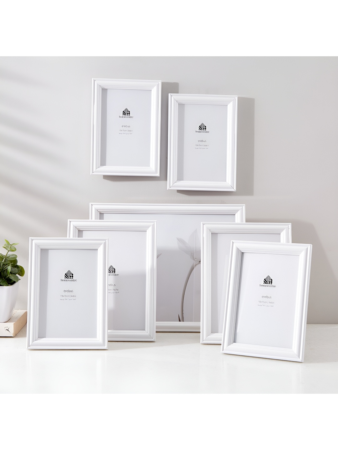 

Home Centre sepia lucas White 7 Pieces Plastic Wall Photo Frames