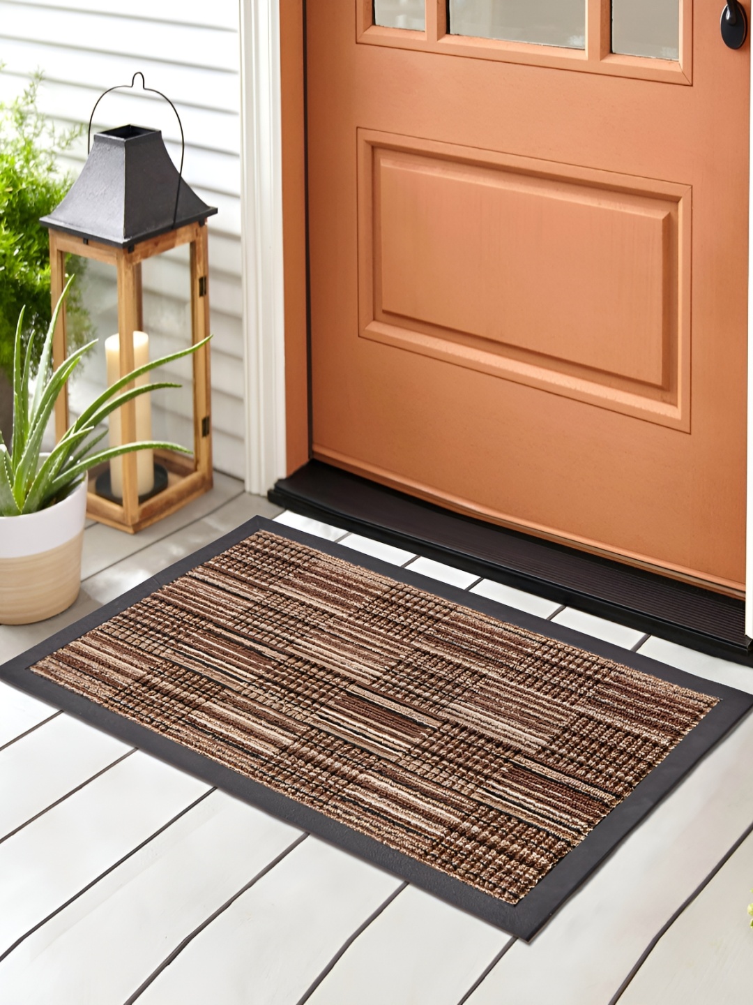 

Home Centre Brown Printed Rectangle Doormat