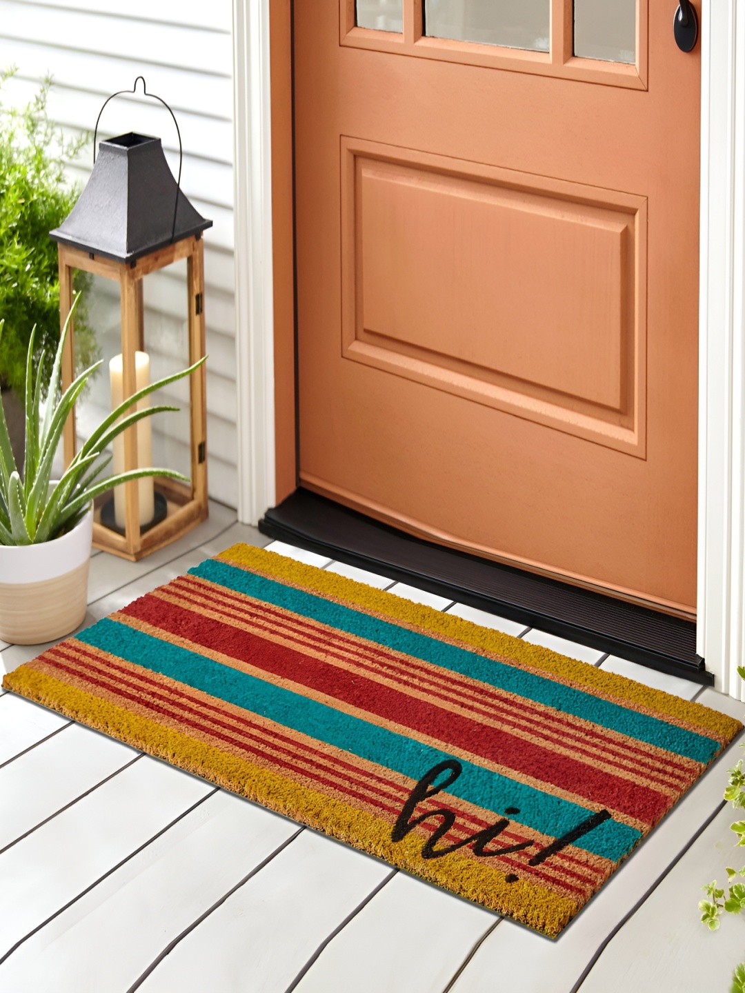 

Home Centre Stencila Coir Red & Blue Striped Doormats