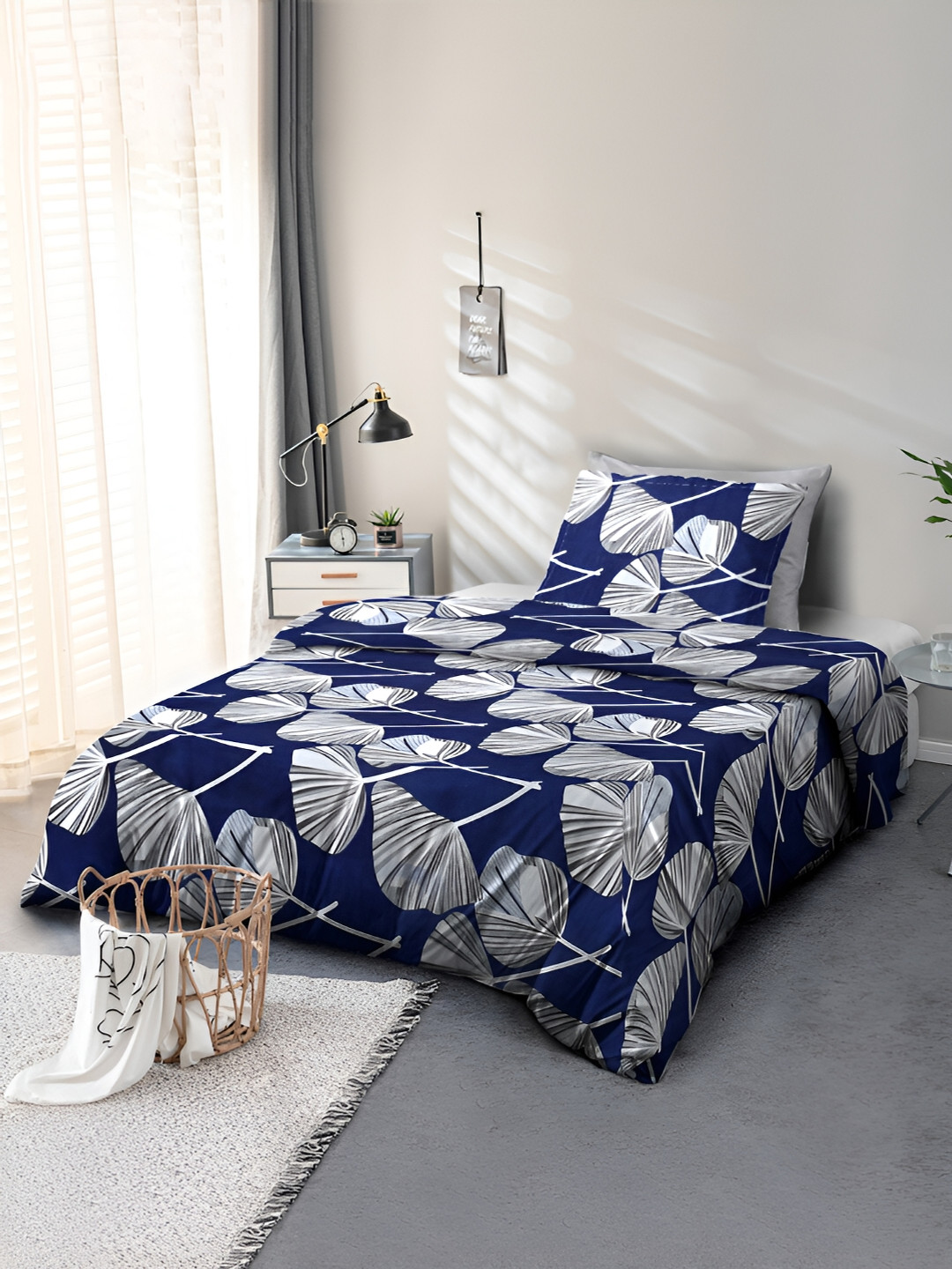 

Cortina Navy Blue & White Floral Printed 110 TC Single Bedsheet With 1 Pillow Cover
