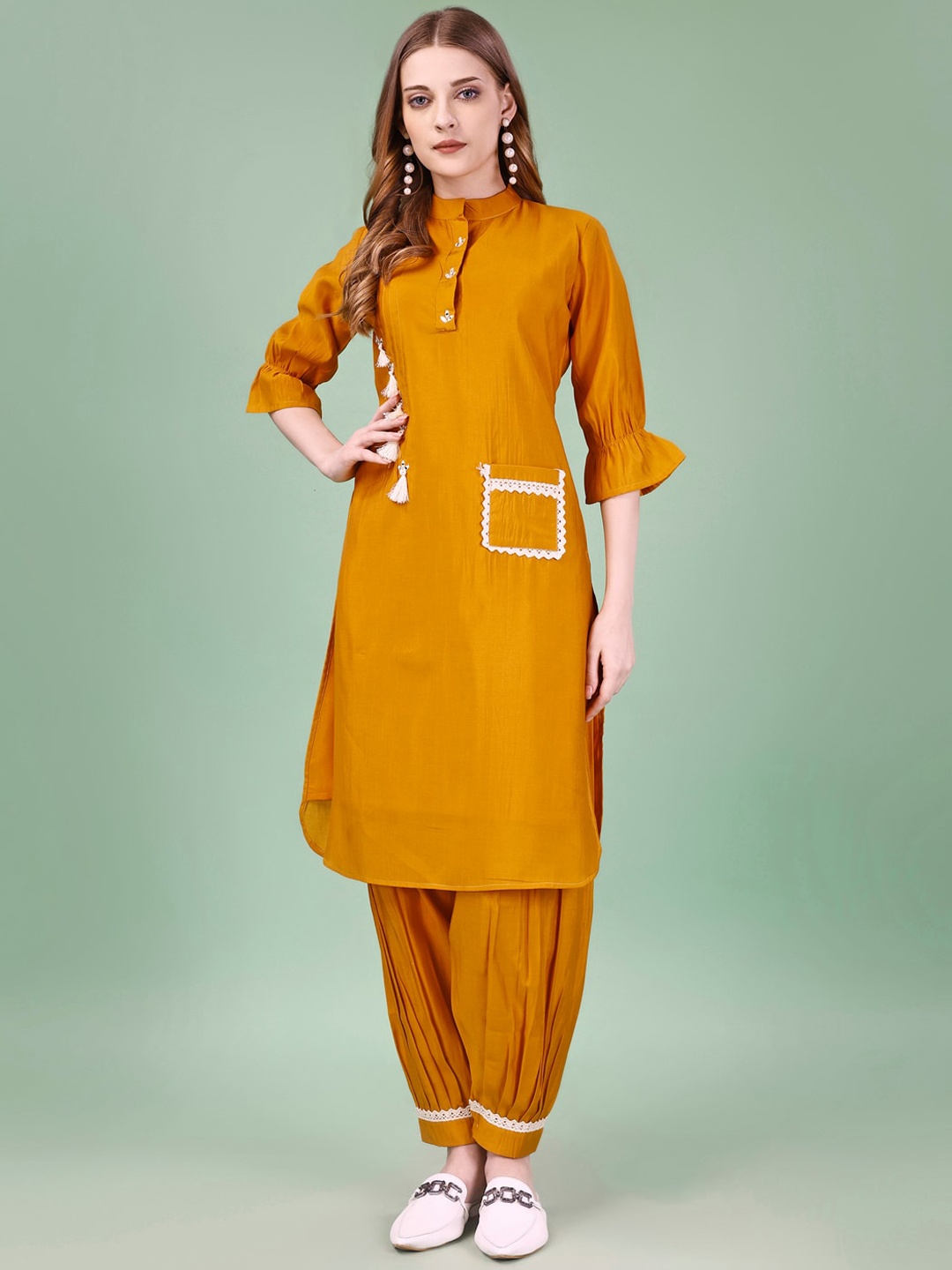 

Tikhi Imli Mandarin Collar Bell Sleeve Tunic & Patiala, Mustard