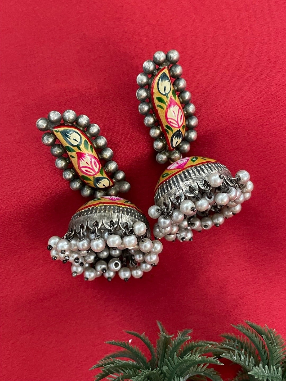 

Digital Dress Room Floral Silver-Plated Jhumkas Earrings