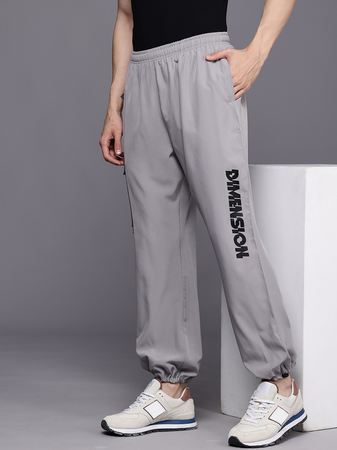 

HRX by Hrithik Roshan Men Typography Printed Relaxed Fit Joggers, Grey
