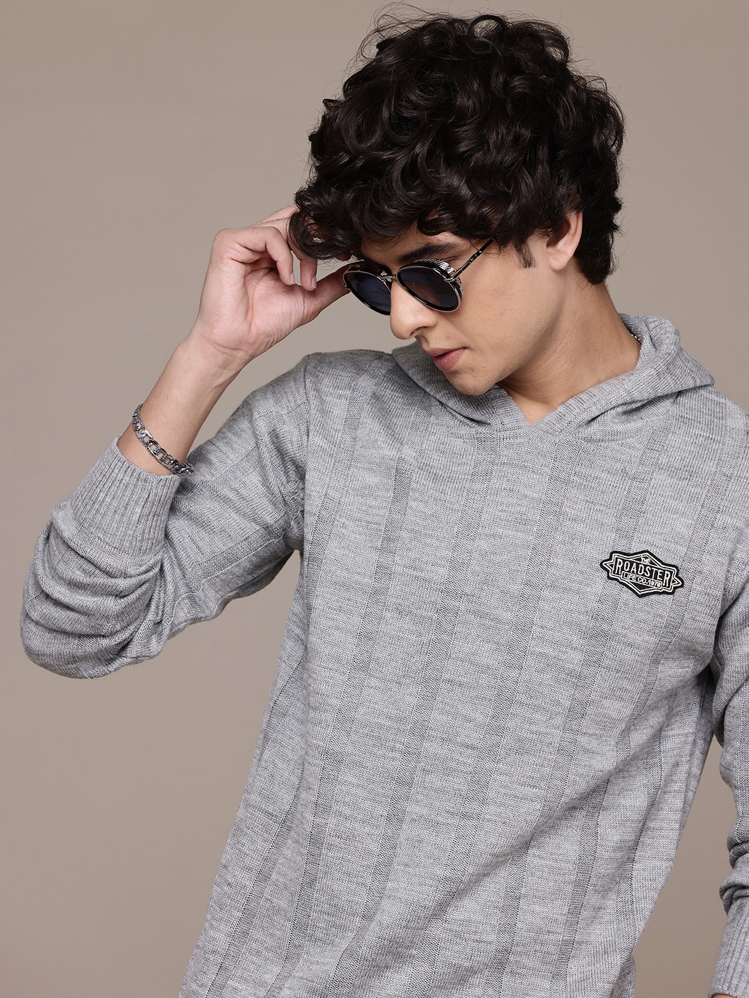 

The Roadster Lifestyle Co. Pure Acrylic Self-Striped Hooded Pullover with Applique Detail, Grey melange