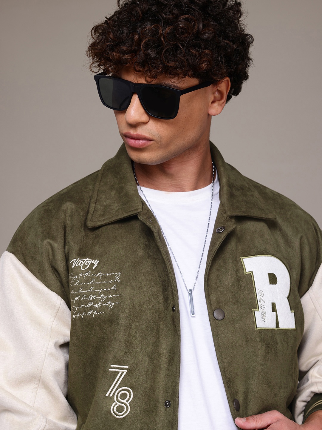 

The Roadster Lifestyle Co. Typography Embroidered Suede Finish Varsity Jacket, Olive