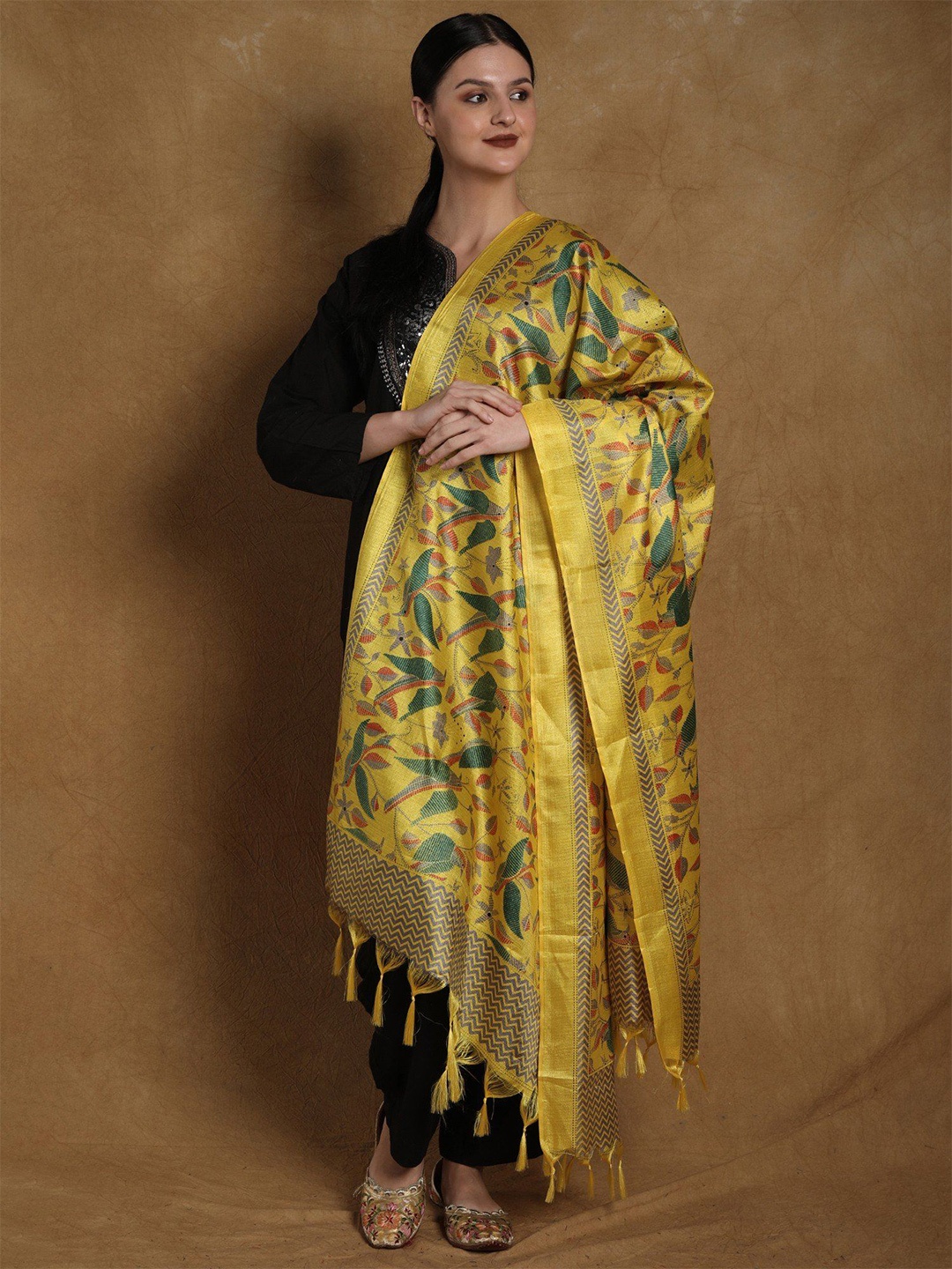 

Exotic India Empire Yellow Banglori Satin Birds and Leaf Printed Dupatta with Tassels