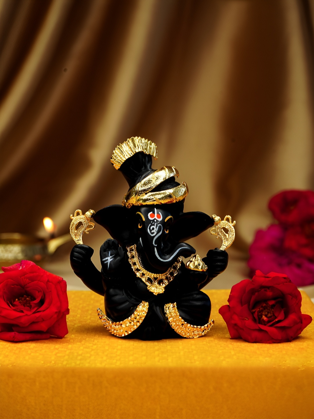 

Ekhasa Black Small Ganesh Idol Religious Showpiece