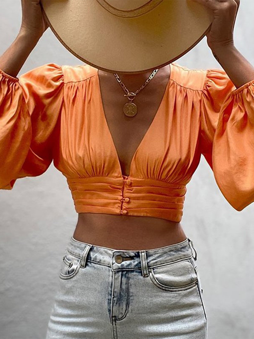

StyleCast Orange Puff Sleeve Styled Back Crop Top