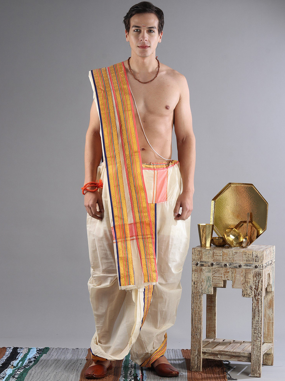 

Exotic India Men Pure Cotton Ready-to-wear Dhoti- Angavastram Set with Zari Border, Off white