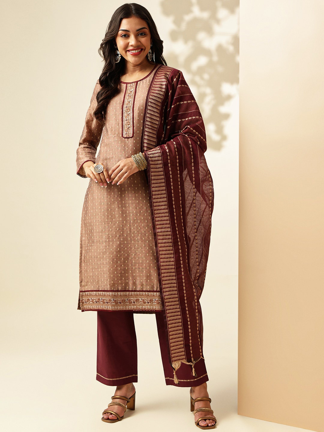 

Anouk Mauve Ethnic Motifs Round Neck Thread Work Chanderi Silk Straight Kurta Set