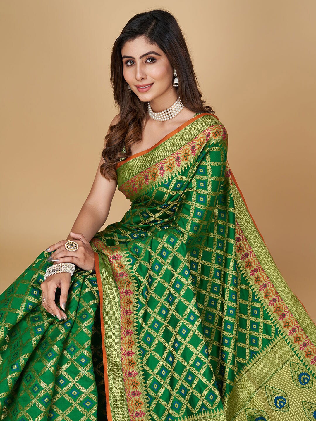 

RAJ DHARMA SILK Woven Design Zari Patola Saree with Tassels, Green