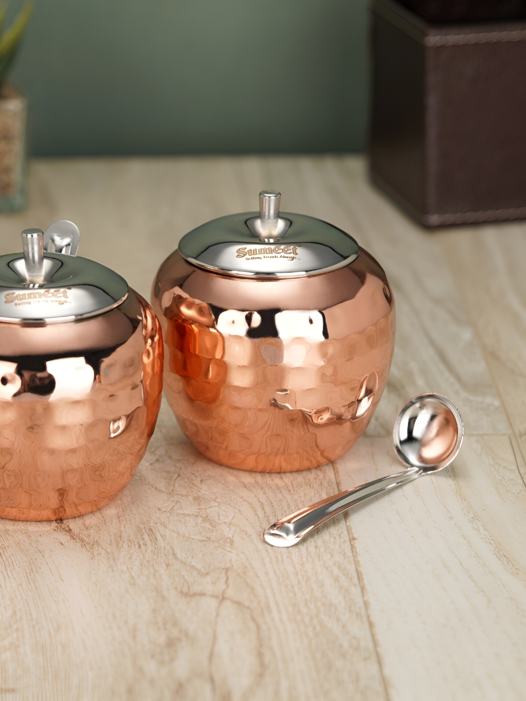 

Sumeet Copper Toned 2 Pieces Textured Stainless Steel Oil Containers With Spoons