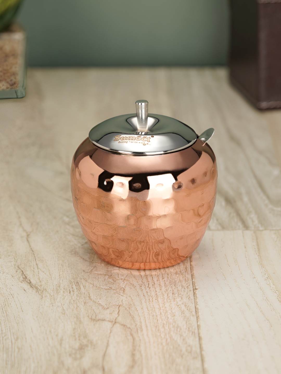 

Sumeet Copper Toned Textured Stainless Steel Container With Spoon 220 ml