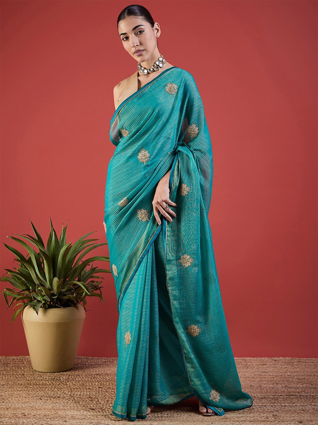 

Anouk Blue Ethnic Motifs Embroidered Brasso Saree