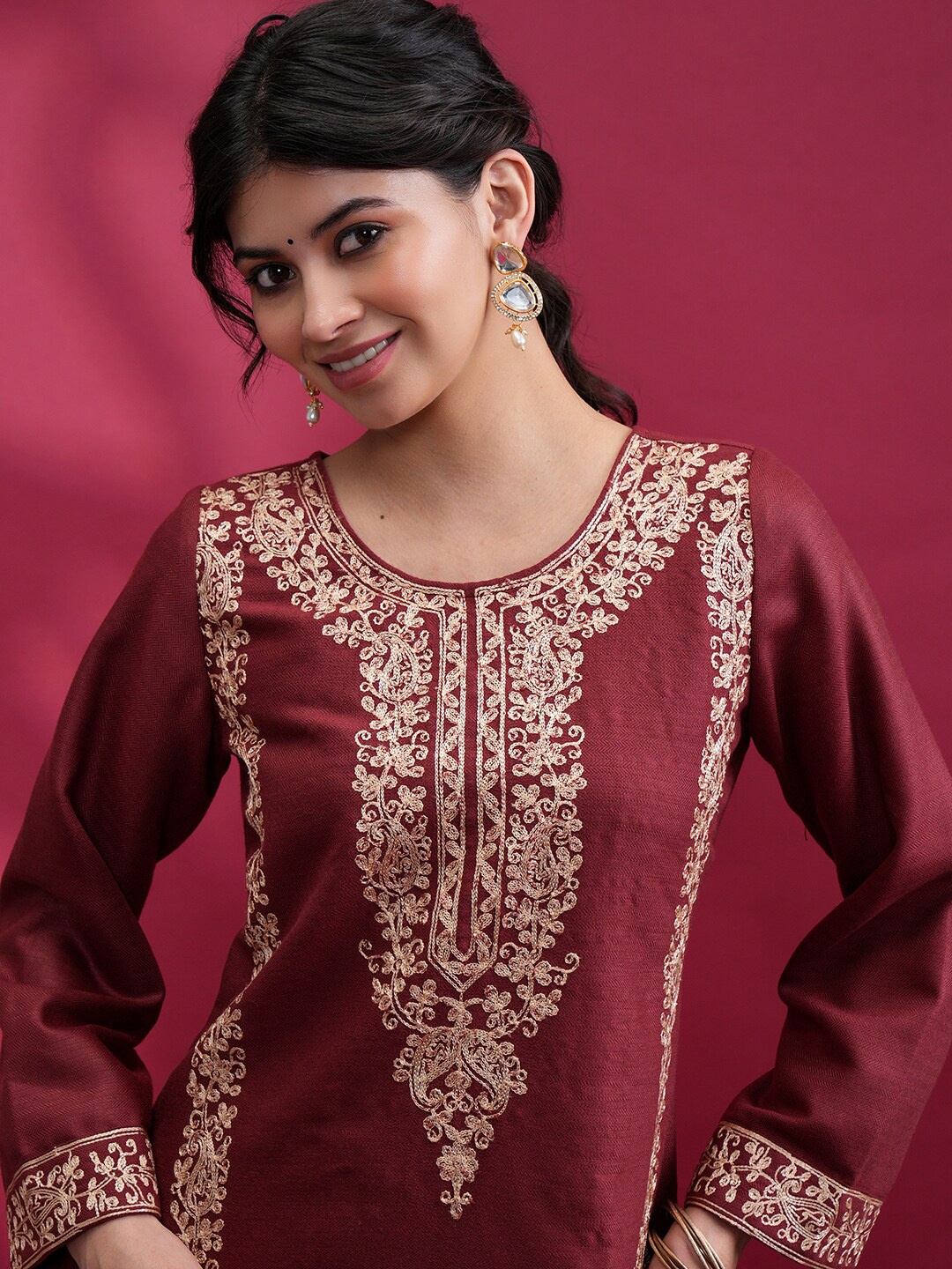 

Vishudh Women Ethnic Motifs Embroidered Zari A-Line Kurta, Maroon