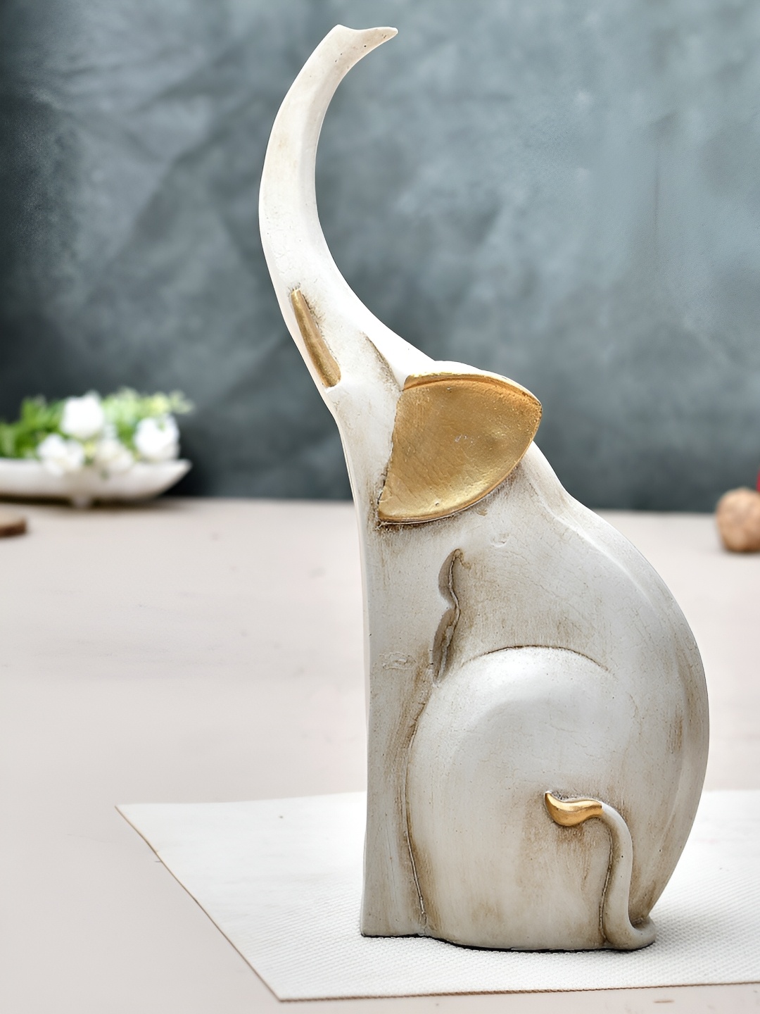 

Craft Junction White & Gold-Toned Polyresin Birds And Animals Small Idol Showpiece