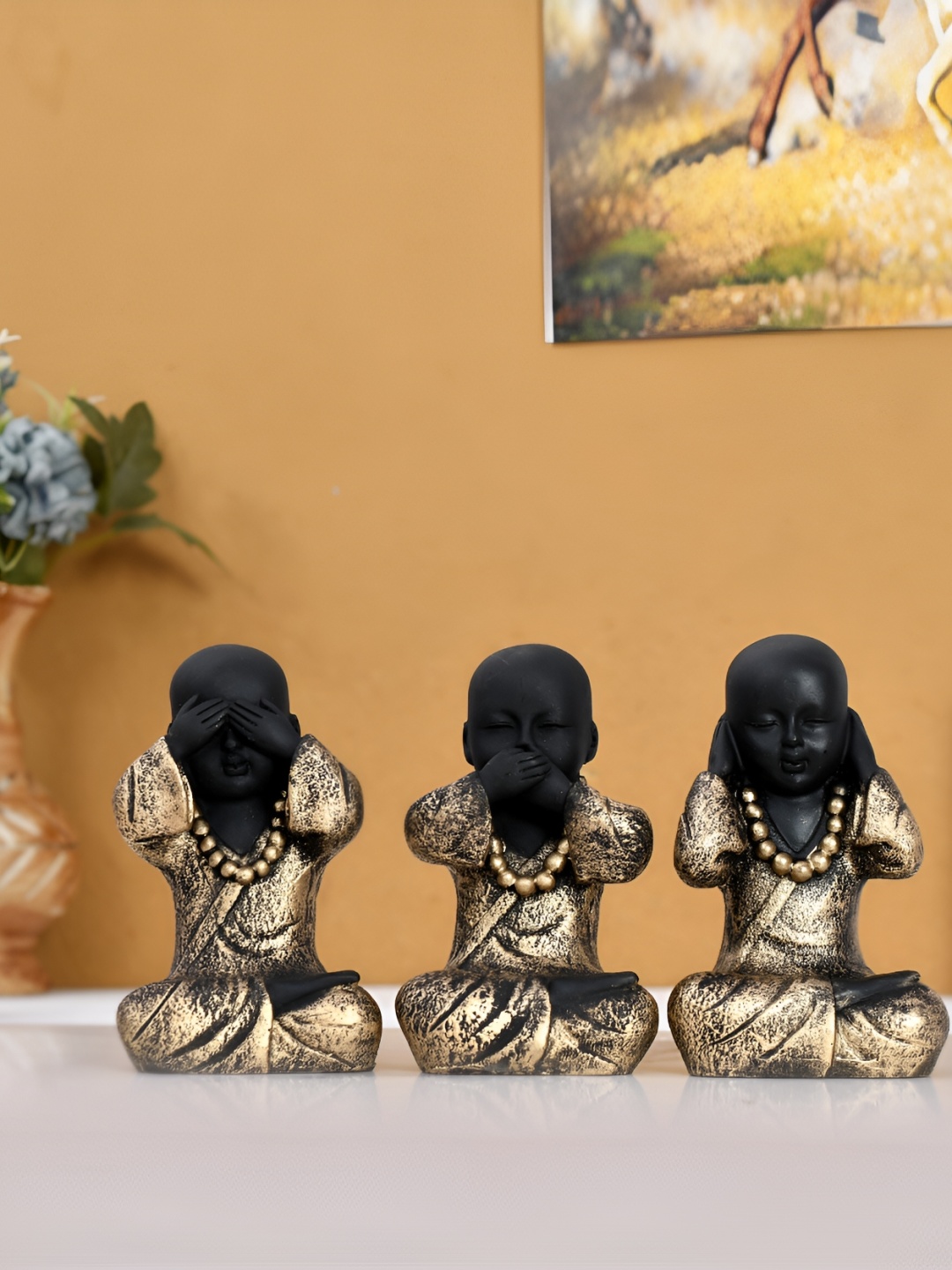 

Craft Junction Black Shy Baby Buddha Monk Statue Showpieces