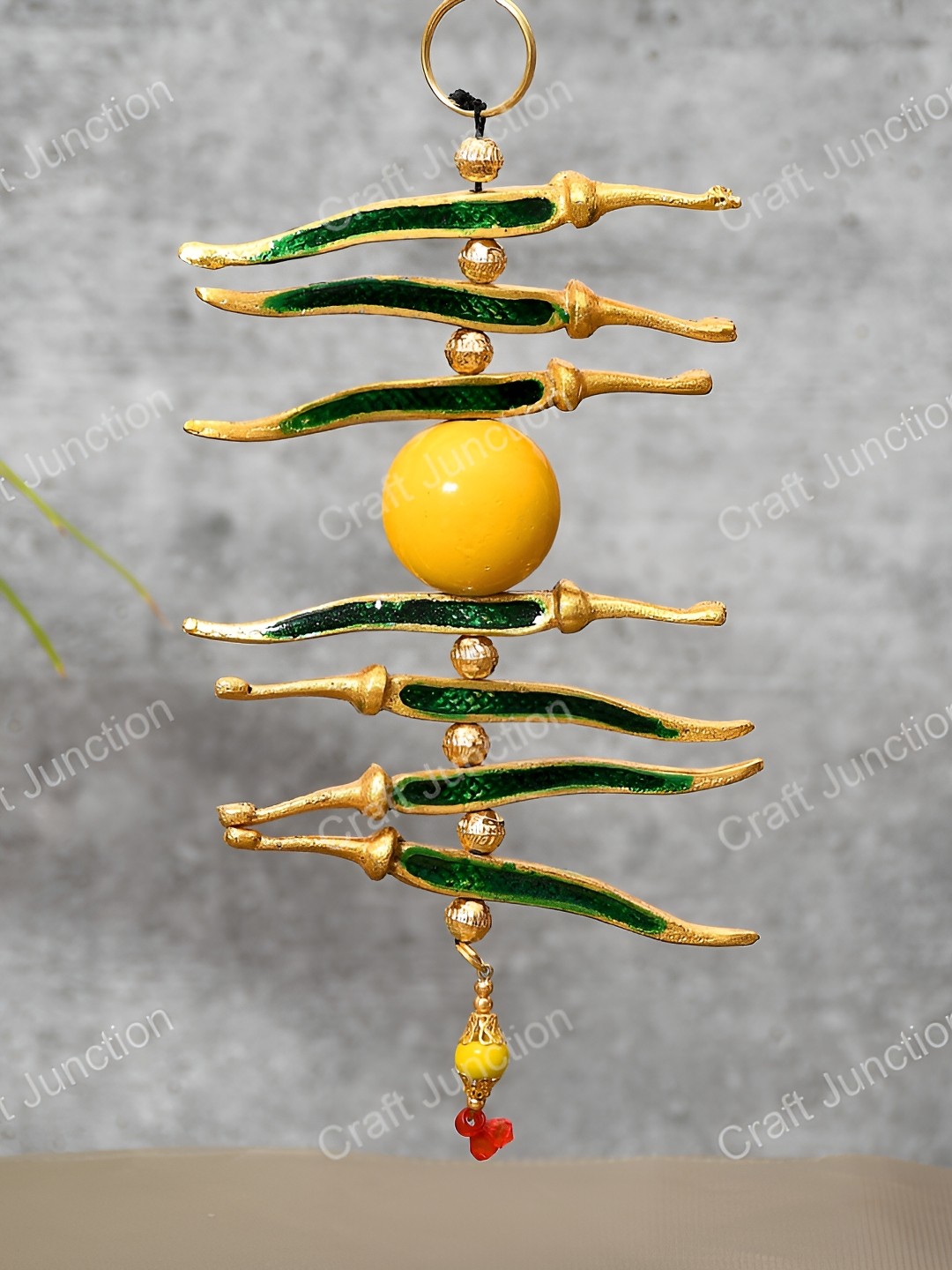 

Craft Junction Gold-Toned & Green Curio Showpiece