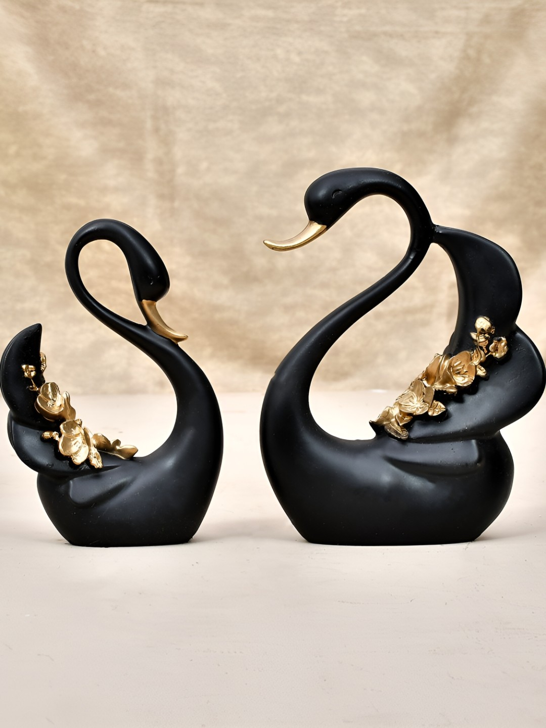 

Craft Junction Black & Gold Toned Birds and Animals Decorative Showpiece
